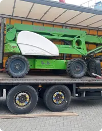 Доставка імпортованого телескопічного підйомника на відкритій платформі вантажівки для подальшого митного оформлення